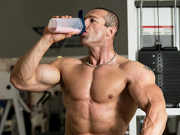 Man drinking Whey Protein powder shake